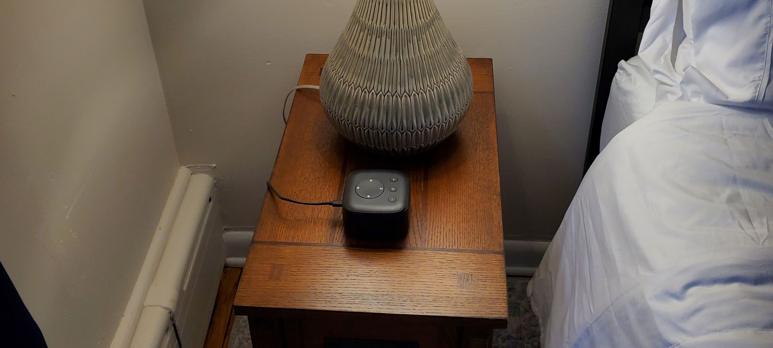 Sound machine on bedside nightstand