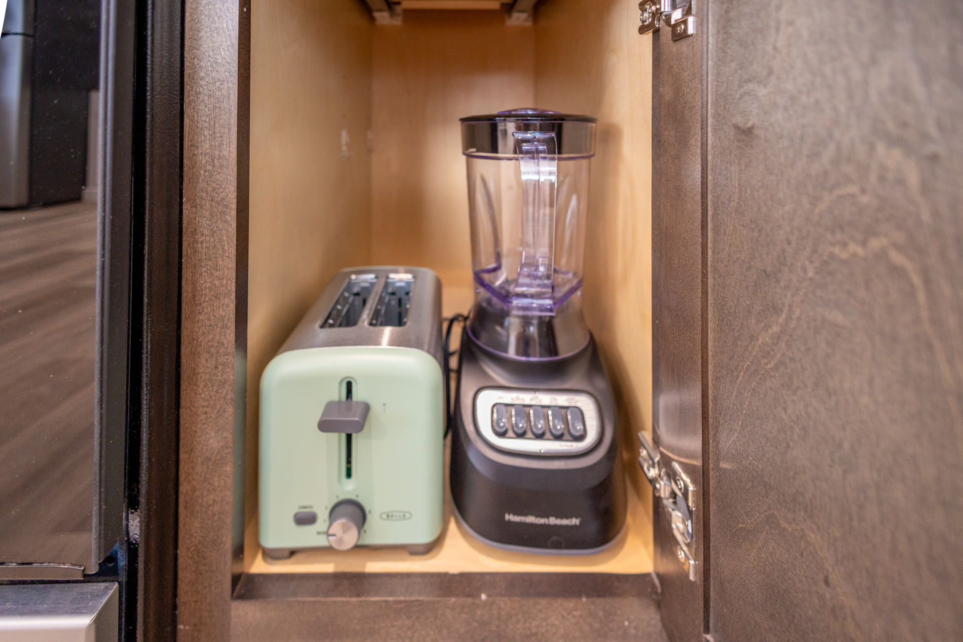 Oak2-35 Cabinet with a mint-green toaster and a black Hamilton Beach blender.