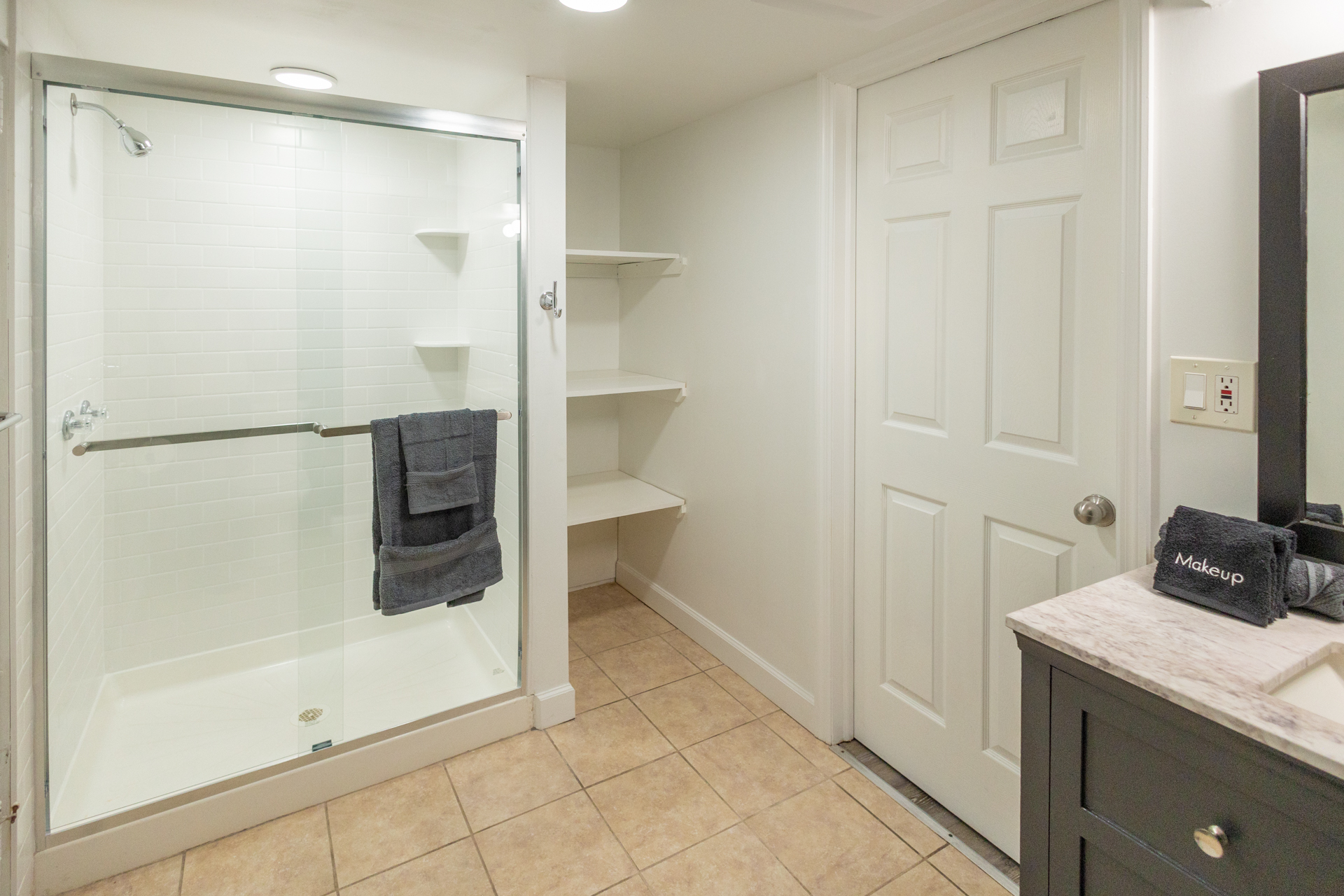 Spacious white bathroom.