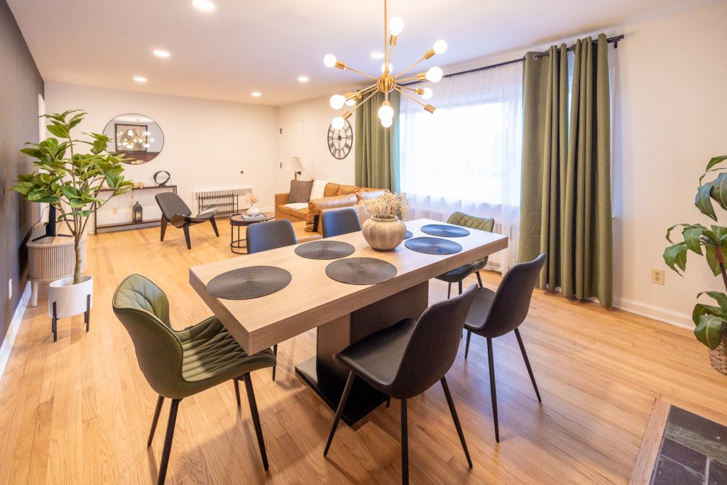 Modern dining area with a table that seats six..